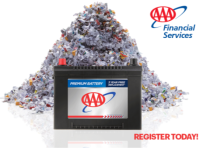 Image of shredded paper and a car battery